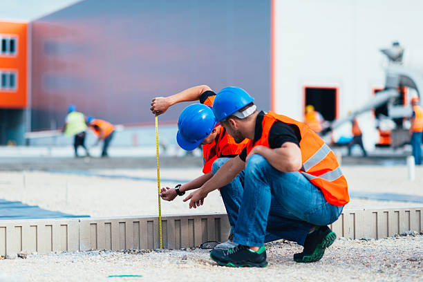 Best Concrete Flooring Contractor  in Wollochet, WA